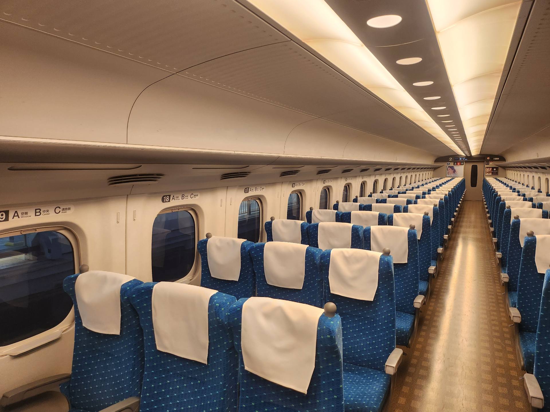 Shinkansen cabin aisle view
